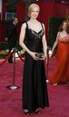 Nicole Kidman, dressed in Balenciaga 
and wearing a L'Wren Scott necklace, poses on the red carpet as she 
arrives at the 80th annual Academy Awards, the Oscars, in Hollywood 
February 24, 2008. (Lucas Jackson/Reuters)