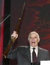 National Rifle Association President Charlton Heston waves a 
Winchester 1866 lever-action rifle during the NRA's Annual convention in
 Orlando, Florida in this April 26, 2003 file photo. Heston passed away 
at the age of 84, his family said on April 5, 2008. (Shannon 
Stapleton/Files/Reuters)